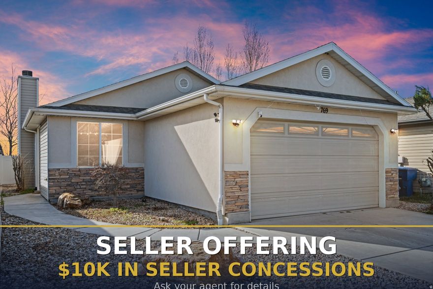 Seller offering $10K in concessions! No HOA! Charming single-level rambler in North Salt Lake. Wood-look tile, abundant natural light, open layout, 2-car garage & easy access to parks, shopping, and I-15.