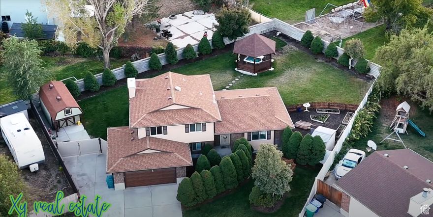 Fantastic multiple levels home in quiet safe neighborhood; dynamite backyard w/garden area and Jacuzzi hot tub covered by alpine style gazebo. House has been freshly painted and has been remodeled w/newer furnace, water heater, AC & roof. Fully landscaped yard surrounded by mature trees and fencing. House has newer vinyl windows; kitchen and baths have upgraded fixtures w/water saving toilets. There is a covered patio w/variable recessed lighting in the rear plus separate workshop bldg w/electricity and insulation. Close to schools, shopping and public transportation.