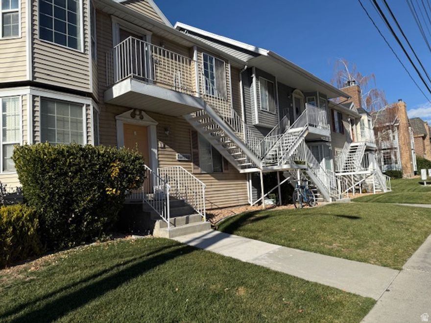 Great condo located just 2 blocks south of BYU Campus!  End unit with 2 bay windows, fireplace and easy access to parking and campus!  Covered parking with large storage closet.  Zoned for 3 singles or a family.  Currently rented through August 17, 2026.  As of now, no contracts signed for the 2026-2027 school year, so you can place your own kids in the unit this fall and collect the rents until then!  Washer/Dryer and all the appliances included!  Don't miss out on this one!  Check out the video tour on the MLS!  24 hours notice to show.