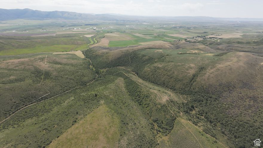 Massive 720 acre, fully-fenced and cross-fenced range land in Bear Lake at only $1,944/acre! Good feed here for summer range ground for ~50 pair of cattle, complete with 3 great springs (one is shared) making it super convenient for stock water. And if you're not a cattle rancher, there are lots of great groves of trees, along with breathtaking views of mountains on all sides, and the valley to the East, making this property a prime hunting or recreational paradise, ready for you to build your cabin or pull your camper and enjoy the shady trees and expansive rolling hills on the property to ride your ATV's or snow machines! Not far from all the other fun trails, canyons, and recreation of the Bear Lake area, as well. Come make this yours today! West boundary of property is on intersection of Stauffer Canyon Rd and Ledge Hollow Rd, just 1/2 mile north of the Sharon Loop Rd. Final Address TBD.
