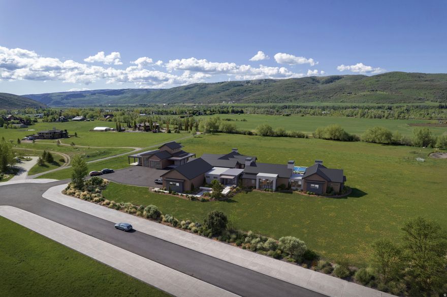 Build your dream legacy retreat in Summit County with a rare opportunity in Elk Meadows-a premier setting for privacy, views, and true mountain living. This exceptional homesite offers the perfect foundation to create a custom luxury lifestyle property with direct access to the best of Park City and Summit County recreation.  What makes this opportunity truly special is the amount of work that's already been completed for you. Included with the sale are fully designed architectural plans for an extraordinary luxury residence along with a stunning estate-grade detached lifestyle structure-a barndominium-style mountain building designed for elevated living, gear and toy storage, workshop capability, and long-term value. Even better, the interior design work has already been completed for both structures, including key finish selections and layout vision-saving the next owner significant time, cost, and decision fatigue. Also, five valuable Water Shares are included with the property.   This is more than land-it's the chance to step directly into a curated build path with a premium design package already in place. Whether you want to create a full-time mountain home or an unforgettable second-home escape, this property is a true launchpad for the Summit County lifestyle, including world-class boating, hiking, mountain biking, skiing, snowmobiling, and year-round adventure.  A rare combination of prime Elk Meadows location + completed architectural plans + interior design package makes this one of the most compelling luxury land offerings in the area.  Design package details, renderings, and build vision materials are attached inside the listing.  We have plans for a barndominium/ADU. Inquire with the Agent for details.   Additional build of ADU / Garage Barn plans are attached.  7 interior parking spaces.  2 full bedroom/bathroom suites, 1 half bathroom, living room, and kitchen.  Fireplace. Loft area on the upper floor.  Living area is 1708 SF, Garage is 2504, Storage/Mechanical is 735 SF.