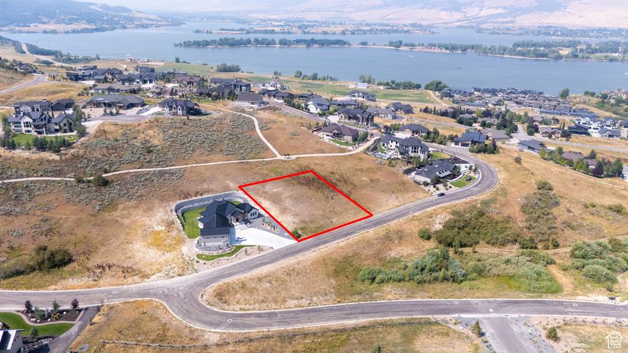 Part of the EDGEWATER CHALET subdivision LOT 59R. This beautiful neighborhood is situated on the south end of Pineview Reservoir in the small town of Huntsville, Utah. With direct views of Snowbasin and the surrounding mountain, the area is serene and beautiful all year round. The location offers many opportunities for all kinds of recreation including skiing, boating, golfing, fishing, hiking, snowshoeing, biking and much more. The quiet town gives you a chance to relax and escape the hustle and bustle, but is just a short, 20 minute drive from downtown Ogden with plenty of restaurants, shops, entertainment and nightlife. Come build your dream home on one of few remaining lots of the Edgewater Chalet's!