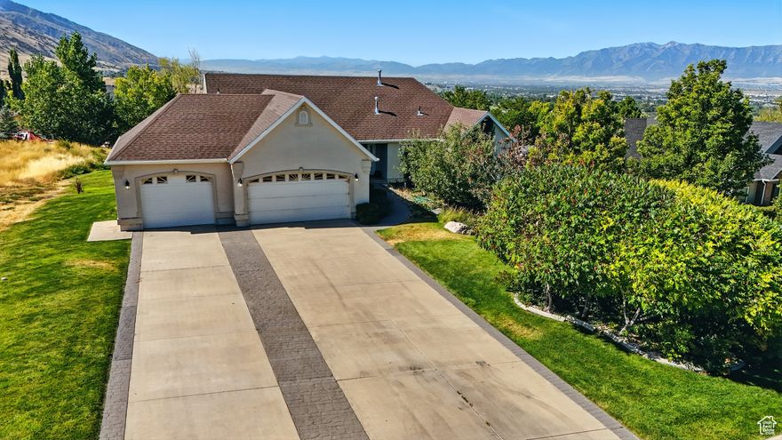 Prime location! This great home has amazing views! 5 bedroom, 3 bathroom home sits on a huge .67 acre lot. Lot's of living space and a great home to add your own touches to.
