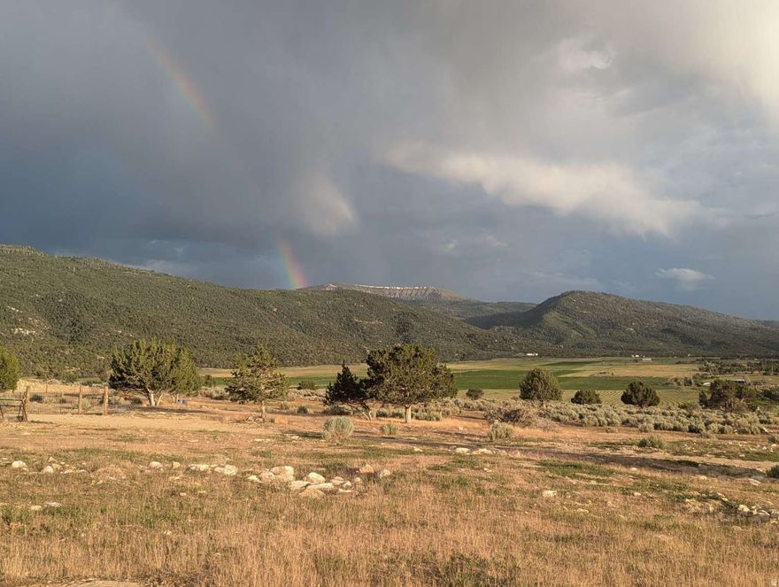 This parcel is ready to build your dream home in one of the most pristine locations in Spring City. These photos don't do the true beauty justice. It sits at the base of Canal Canyon, just off the canyon road to the east, with a short dirt road to the dead end where the lot sits. The well and pump are already installed, septic plans are complete and power is close. With over five acres, you'll have plenty of room to build your custom mountain home and bring the animals! You really won't find a more beautiful piece this close to town.