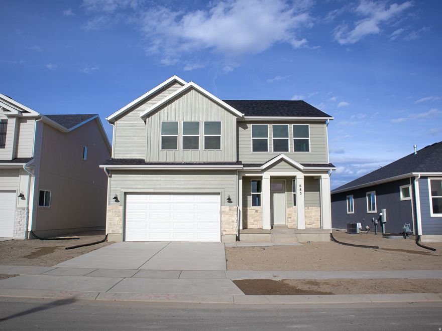 AMAZING $15,000 INCENTIVE TOWARDS CLOSING COSTS, RATE BUYDOWN, OR PRICE REDUCTION REGARDLESS OF LENDER! Must-see Harmony Community in Eagle Mountain! Move-in ready! This beautiful home built by Flagship Homes features 4 bedrooms, 2.5 bathrooms, quartz slab countertops, painted cabinets, laminate flooring on the main level, a large loft on the 2nd floor, landscaped front yard, 2 car garage, and backyard can be landscaped for an additional charge. The primary bedroom has a vaulted ceiling, large walk-in closet, and dual sinks with a separate tub and a double shower. With an unfinished basement, this home provides space for storage and room to grow. (If preferred, basement can be finished for an additional charge.) 1GB fiber optic internet included in the HOA dues. Call for more information or stop by our model home at 3859 N. Thomas St., Eagle Mountain for a tour. Model home hours: Monday-Saturday 11 AM - 6 PM. Buyers to verify all information. Square footage is from house plans.