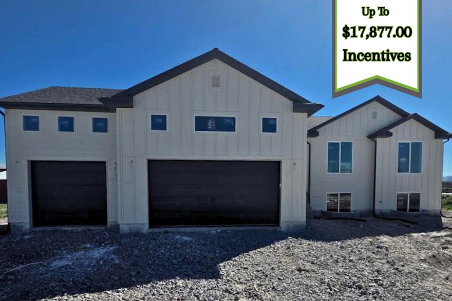 Welcome the SUNBROOK to the family!  Brand new, stunning floor plan  under construction in Elwood. This impressive 3,176 sq ft single-level home offers a perfect blend of style, space, and modern functionality. Featuring 3 bedrooms and 2 bathrooms, the open-concept floor plan is ideal for entertaining and everyday living alike. The heart of the home is a spacious great room with a cozy fireplace, flowing seamlessly into a chef-inspired kitchen with stained cabinets, a stainless steel gas range, and beautiful pendant lighting. Elegant wrought iron railings and luxury vinyl plank flooring add sophistication and durability throughout the main living areas.  The large master bedroom features a master bathroom with a spacious walk-in shower and a relaxing soaker tub-perfect for unwinding after a long day, flowing seamlessly to a generous walk-in closet. Car enthusiasts  will love the 3-car garage. The exterior features a Hardie board front, combining low maintenance with timeless curb appeal, while the unfinished basement provides incredible potential for future expansion. Every detail of this under-construction rambler is designed with quality and style in mind. Don't miss the chance to make this Elwood beauty your dream home and add your personal touches before it's complete!