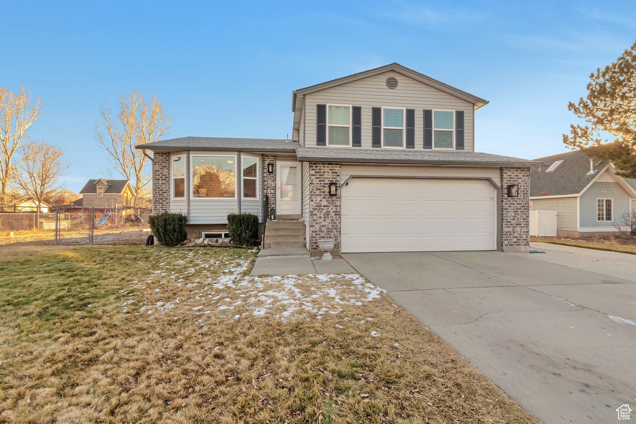 Great 4 Bedroom, 3 bath home in Highland. Bathrooms were all remodeled in 2019. New kitchen in 2020 with Quartz counters  and Stainless steel appliances. Refrigerator, washer and dryer are included. Large lot and fully fenced yard. Newer deck. Shed and play equipment included. Vegetable garden and Peach, Nectarine and apple trees.