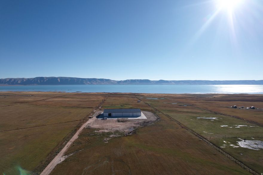 This is a one of a kind property! Lake access, and an 18,000 square foot shop built with the future in mind. Shop is plumbed and wired for 4 master bedrooms, and a complete commercial kitchen. There are so many possibilities with this property, call listing agent for your private tour and showing.  Buyer to verify all information.