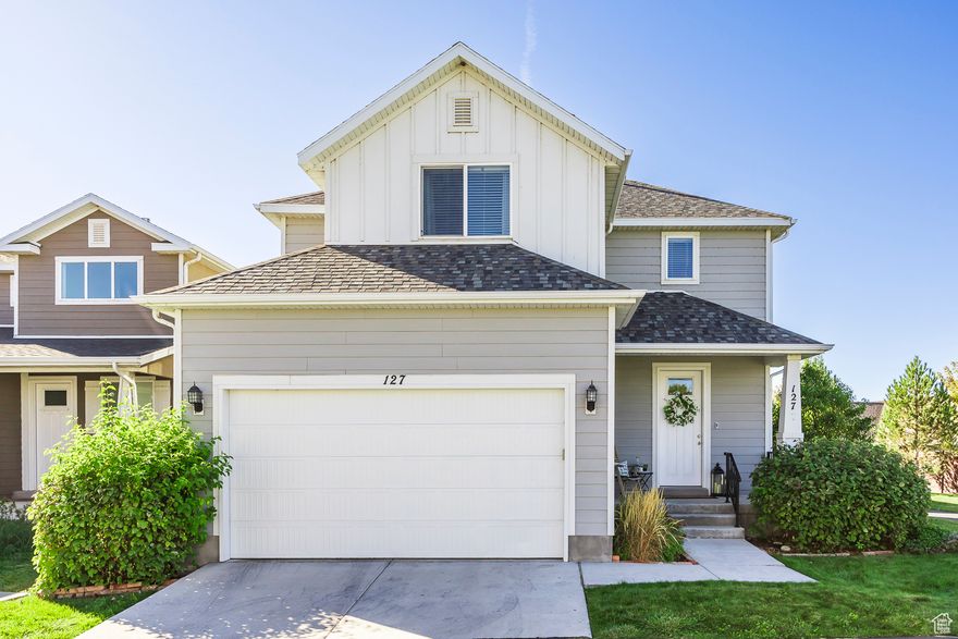 Open House Friday OCT 10th 4-6pm and Saturday OCT 11th  noon - 2p Single Family Home in The Springs subdivision of Waters Edge in Vineyard. Located on the end of the row, this home sits adjacent to an extra grassy area and the biking/hiking paths. Walk in to an Open Concept Living Room, Dining Area, Kitchen.  Large Pantry, Guest Bath and Laundry Room on the main floor. Upstairs you will find 3 bedrooms and a loft style family room, which could easily become another bedroom if desired.  The Primary bedroom has high ceilings and an En Suite bathroom with a separate shower/ tub and double sinks, along with a walk in closet.  This home also has a fFULLY FINISHED basement (with window wells for lots of light) that also has a family room, a 4th bedroom and another full bathroom! There is also an additional Flex space-no window- that could be an office, work out room, craft room, extra storage, reading nook--YOU decide!!!  The backyard currently has garden boxes which can stay or go. The Waters Edge community has a astounding Clubhouse with lots of entertaining space and a kitchen, two pools, gyms, sports courts, picnic areas, fire pits, playgrounds and more! Situated within walking distance of the Utah Lake with lovely walking paths.  The Grove Park is also nearby with a splash pad,sports courts and playgrounds. Located near Trax, which goes from Provo to SLC, makes commutes easy, and the new Utah City is being built nearby with so much more to come! This home also comes with an extra outdoor owned parking space!!! This sweet abode is priced to sell! Come and take a look and then Fall in Love!!