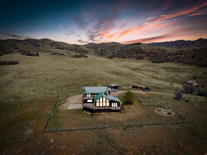 Beautiful 103 acres of complete privacy with panoramic views, and you're still just a short drive to Spanish Fork. That balance is what makes this property so rare and so hard to find. The 4,688 sq ft two-story home offers 5 bedrooms and 4 bathrooms, two decks, a patio, and views that remind you exactly why you bought it. The property has been well maintained for year-round access and usability, with the focus on keeping the land functional without sacrificing its natural character. The home runs fully off-grid on solar, propane, and a private well, with a secluded  access road shared with only one other home. Space for animals, farming, and recreation. Room to spread out, build something lasting, or simply escape. Whether this is a full-time residence, a second home, or a legacy property, the land supports it all. Everyday conveniences are just a 20 minute drive away: shopping, groceries, dining, and access to the I-15. The canyon systems and outdoor recreation are practically at your door. Properties with this combination of acreage, privacy, usability, and location simply do not come available often. Measurements provided as a courtesy only, buyer to verify all info.