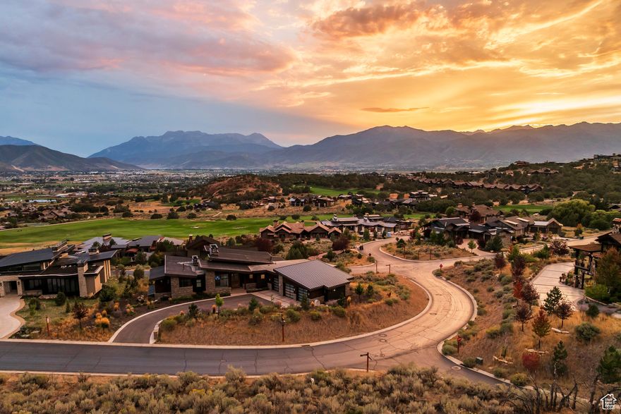 Imagine waking up to Mount Timpanogos framed perfectly from your windows, its changing colors marking the rhythm of your day. This premier 1.85-acre corner lot in the gated Red Ledges community offers a front-and-center view corridor rarely available - the ideal canvas for a legacy mountain home. The gradual slope is perfectly suited for a walk-out design with expansive outdoor living spaces, where sunrises greet you on the deck and sunsets pour across the Heber Valley. Step outside and you're minutes from a round on the Jack Nicklaus Signature Golf Course or a relaxed afternoon at the Golf Park. Off the fairway, your days might include laps at the club pool, a match at the tennis center, or a ride from the equestrian facility into the surrounding hills. Miles of private trails connect you to nature for hiking, biking, or quiet evening strolls. With its commanding position, unmatched views, and access to world-class amenities, 680 Pinto Knoll is where your vision for the perfect mountain home can take root. A full golf membership is available to purchase in addition to the property.