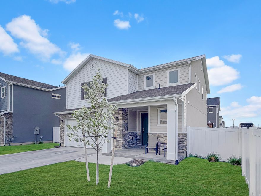 Welcome to this beautifully maintained, original-owner home in Syracuse's highly sought-after Still Water neighborhood, showcasing true pride of ownership throughout. Offering an open floor plan with 9-foot ceilings and a spacious great room that flows seamlessly into a classic white kitchen featuring granite countertops, a center island with bar seating, and a walk-in pantry, this home is designed with both comfort and entertaining in mind. The main level features durable LVP flooring, abundant natural light, and neutral designer finishes that create a warm, inviting atmosphere. Enjoy morning coffee on the covered front porch or relax in the fully fenced backyard, thoughtfully designed for easy living with maintenance-free xeriscaping, high-end turf, and a built-in putting green-perfect for gatherings or quiet evenings at home. The 2-car attached garage adds convenience and extra storage. Upstairs, the light-filled primary suite features three large windows and a spa-style bath with an oversized shower, granite vanity, separate water closet, generous walk-in closet, and additional linen storage. Two additional bedrooms-including one with double closets-a full bath, and a conveniently located laundry room complete the second level. Washer, dryer, and refrigerator are all included, making this home truly move-in ready. Situated just steps from incredible community amenities including playgrounds, a clubhouse, pool, gym, pickleball courts, and scenic walking trails, this home also offers quick access to the West Davis Corridor, making commuting a breeze. Located near the soon-to-open Costco and a brand-new elementary school currently in its final phase of construction, this home combines modern living with unbeatable convenience. Don't miss this exceptional opportunity-call today!