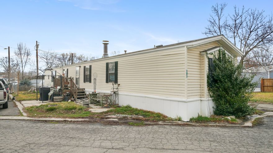 2007 mobile home located right on North Main in Springville. This 3 bed, 2 bath home offers 1,200 sq ft of functional living space with an open layout and comfortable bedroom sizes. Lot rent is $675/month. Conveniently situated near grocery stores, restaurants, parks, schools, and quick access to I-15, making commuting through Utah County easy. Just minutes from downtown Springville and a short drive to Provo. Affordable living in a central location with everything you need close by. Square footage figures are provided as a courtesy estimate only and were obtained from county records. Buyer is advised to obtain an independent measurement.