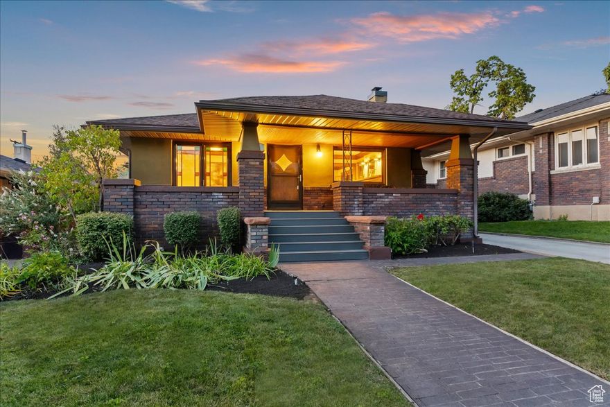 Offering the ideal combination of vintage character and recent enhancements, this pristine Gilmer Park bungalow is ready to impress. The hallmark elements that make a home of this era so special have been lovingly preserved while functional updates of the home's internal systems (plumbing, HVAC, and electrical) were completed with permits in 2022.   The main level has a comfortable and cohesive layout with a professionally designed interior. Cozy up by the gas fireplace or pass through the French doors to the spacious covered front porch with durable Trex decking. The welcoming living room is framed by original glass front built-in cabinets and gumwood trim. A freshly-remodeled kitchen boasts ample storage and stainless steel appliances. Three bedrooms and a gorgeous bathroom complete the main level.   The lower level consists of an additional living space, another bedroom, and a full bathroom which were all included in the remodel. The fully-fenced backyard includes a deck, raised garden boxes, and a two-car garage. Everything has been accounted for in this move-in ready beauty.