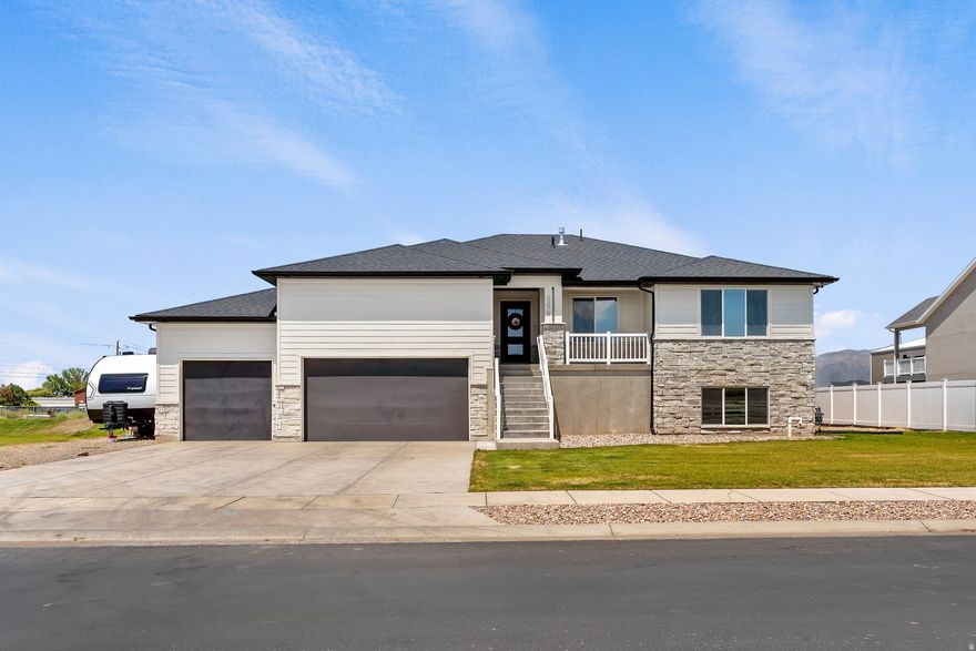 Nearly half an acre in Silver Saddle with extra space to one side.  Built in 2023 with 6 bedrooms, a 4-car tandem garage, and a finished basement designed for flexibility with its own entrance and second kitchen plumbing.  Vaulted ceilings and tall doorways create an open, airy main living space where the kitchen flows seamlessly into the gathering area.  The basement offers extended living or future customization potential.  Oversized cold storage and abundant storage throughout add practical functionality.  The lot layout provides more breathing room than many newer builds, giving you space and privacy-without the wait of building.  Schedule your showing today.