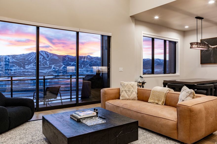 There are nice views and there are serious VIEWS!  This home has that "wow" factor that only Park City's majestic backdrop can provide when you look out of each window.  Located just a short five minute drive to the new East Village Deer Valley via a non-congested route, this location will have you skiing or enjoying water sports at Jordanelle State Park in mere minutes.  Built in 2022, the interiors offer contemporary, earthy finishes and palette that everyone seeks in a home or vacation rental complete with kitchen aid appliances, a hot tub outside and high quality cabinetry and counters throughout. This is a top ranked vacation rental property with an excellent reputation for guest satisfaction with moderate usage.  This home is offered turn key and ready to enjoy right away.  Just bring your skis and toothbrush.  This is a must see!
