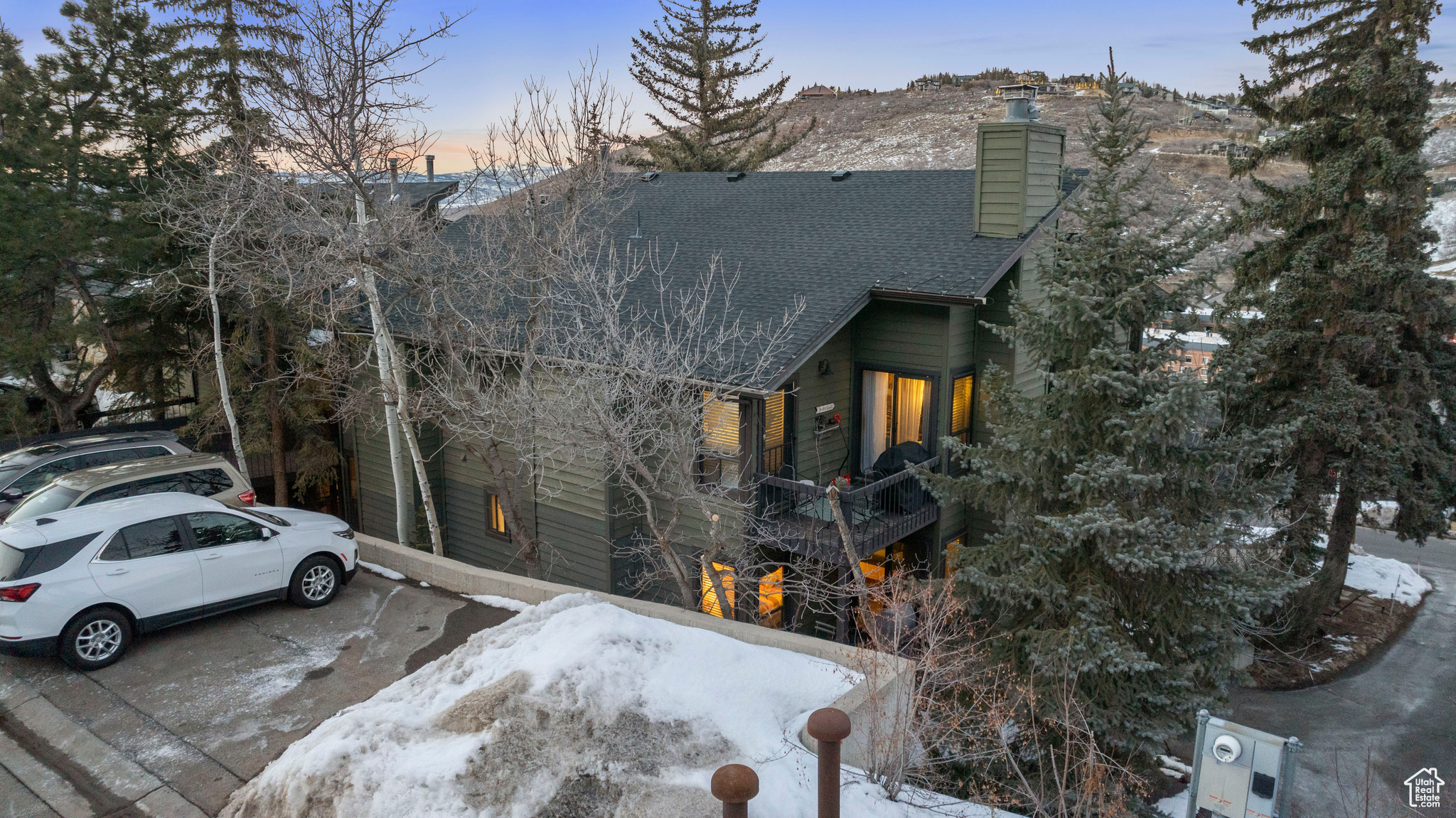 Welcome to 906 Lowell Ave, #1, a charming gem tucked away in the heart of this prestigious Old Town Park City neighborhood. Built in 1979, this well-maintained one-level condo spans a well-planned 834 sq ft, boasting two bedrooms and two full bathrooms. As you step into this home, you are greeted by a cozy ambiance, accentuated by a classic fireplace that adds undeniable comfort to the living area. The efficient kitchen perfectly blends function and style, offering ample space for culinary adventures. Each of the two bedrooms provides comfort and privacy. Adding to the property's convenience is a one-car covered carport with storage space, plus additional parking for your guests. Add the BBQ on the back deck, and you'll find this unit is ready to go, fully furnished and stocked.  Enjoy ski-in and ski-out convenience with a short walk to the ski area as well as easy access to dining and shopping on Main Street. You'll love the majestic mountains in this tranquil region. This condo is an exceptional find, offering the best of both worlds - a quiet, private living space in an accessible, sought-after location.  Popular as a short-term rental, it has received remarkable reviews on AirBNB for the past decade. Take this opportunity to own a piece of Park City's charm.