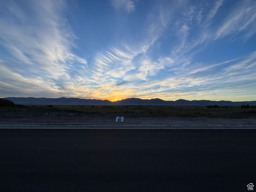 Bring your own Builder! Multiple lots available - Build your dream home in the peaceful and scenic community of Mendon. Blueberry Springs offers spacious 5/8+acre lots with breathtaking views of the mountains and valley. Enjoy paved public roads and full utility access, including Mendon City water, data, power, and secondary water stubbed to each lot. Irrigation water is managed and maintained by the Blueberry Springs HOA. Buyers are responsible for choosing and installing a septic system, subject to approval by Cache County. Each lot includes curb, gutter, and sidewalk frontage. This subdivision allows animal rights in accordance with Mendon City ordinances (https://mendoncityutah.gov). Bring your own builder and design your ideal home while adhering to city setbacks and protective covenants that maintain the neighborhood's appeal.