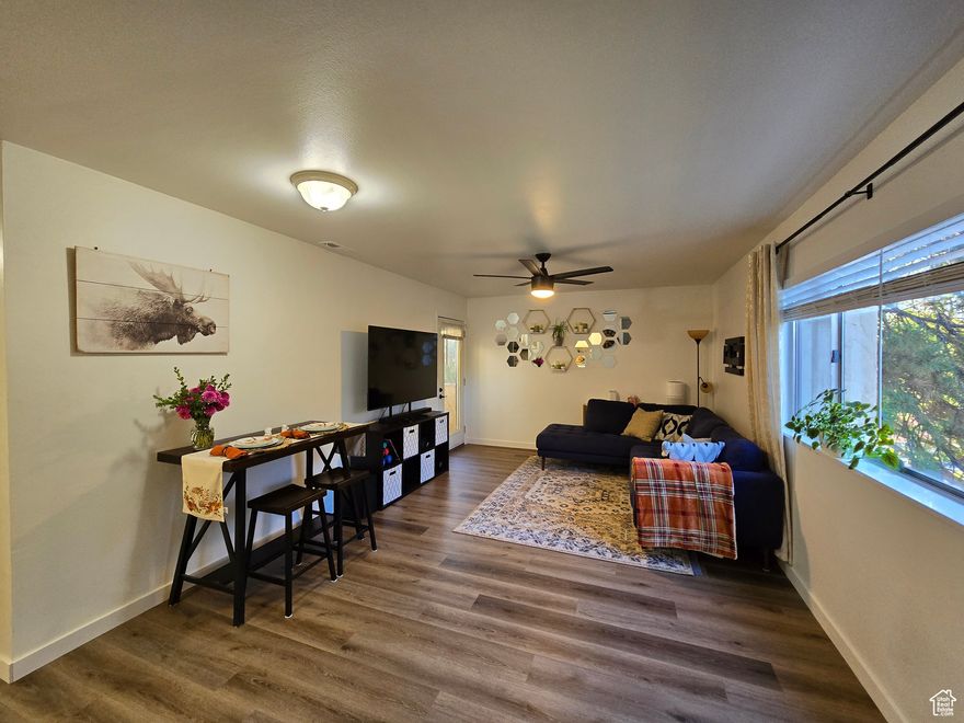 Welcome to Country Wood Condominiums in the heart of West Jordan! This charming 2-bedroom, 2-bath condo offers comfortable living with spacious rooms and inviting balconies surrounded by mature trees, creating a peaceful, private setting. This is a top floor unit and is pet friendly.  Google fiber is available. Enjoy the convenience of community amenities including a refreshing pool, clubhouse, and playground.  HOA takes care of water, sewage, trash removal and snow removal.