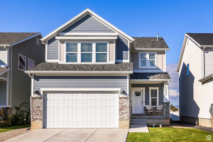 Light, bright, and beautifully upgraded West Haven home! Tall ceilings and an open floor plan create a spacious feel, with an expanded dining nook off the kitchen for extra living space. The large primary suite features vaulted ceilings, a spa-like bath with separate tub and shower, dual vanities, and a generous walk-in closet. Each bedroom also includes a large walk-in closet. Upgrades throughout include quartz countertops, stainless steel appliances with gas range, and a convenient mudroom. The unfinished basement offers room to grow and a huge storage room. Enjoy stunning mountain views from the fenced backyard with a large, upgraded covered patio. Perfect for year-round gatherings. Come see this one in person today!