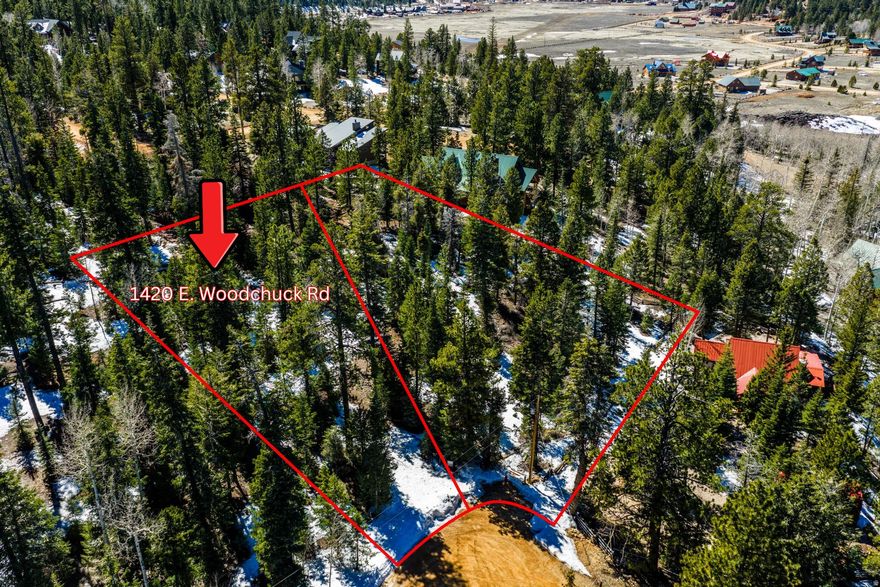 Find your perfect mountain escape with this .42-acre lot in sought-after Duck Creek Village. Located at the end of a quiet cul-de-sac, it offers a rare blend of privacy and convenient access to local amenities.  Enjoy endless nearby UTV/ATV trails, fishing, hiking, and year-round recreation. Zion and Bryce Canyon National Parks are within approximately 45-60 miles, and Brian Head Resort is  approximately 30 miles away.  With a septic tank already installed and no HOA, this property is ready for your vision-whether you're looking to build a peaceful retreat or an adventure basecamp and enjoy the beautiful wildlife.   Listing is for 1420 E. Woodchuck Rd only.