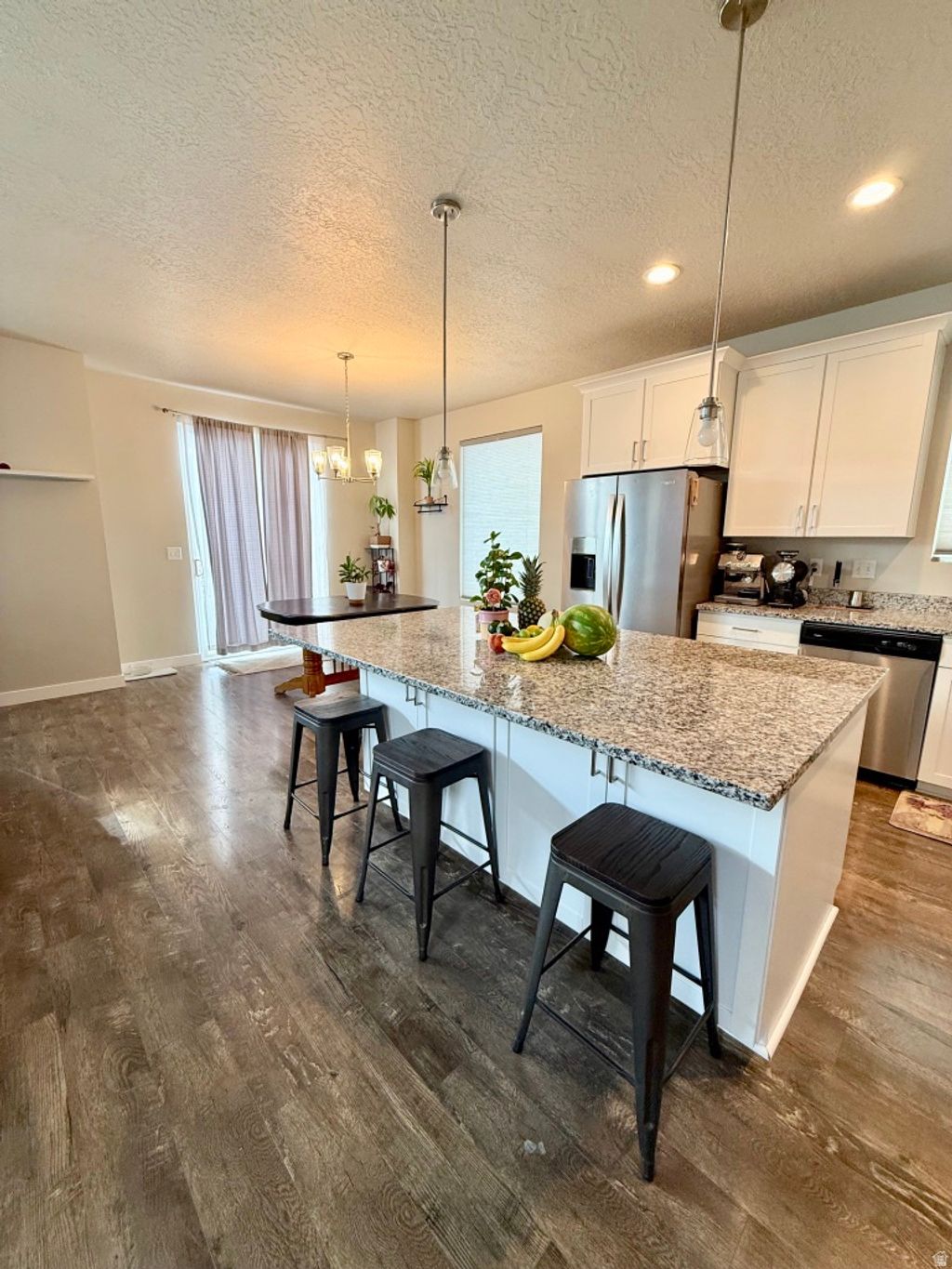 Photo of 8255 N CENTER ST #143, Eagle Mountain, UT 84005 (MLS # 2153849)