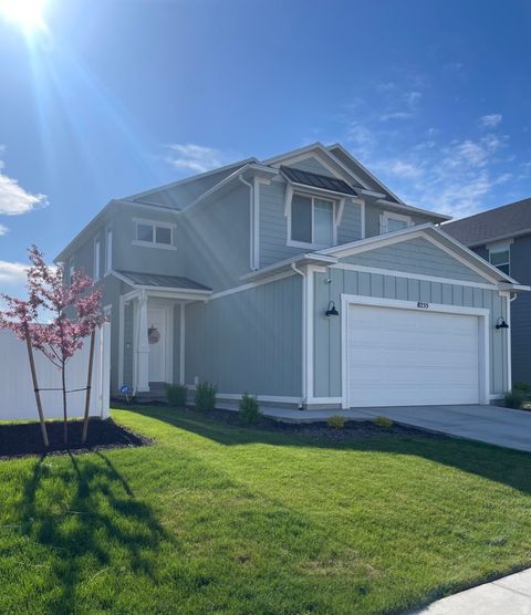 Photo of 8255 N CENTER ST #143, Eagle Mountain, UT 84005 (MLS # 2153849)