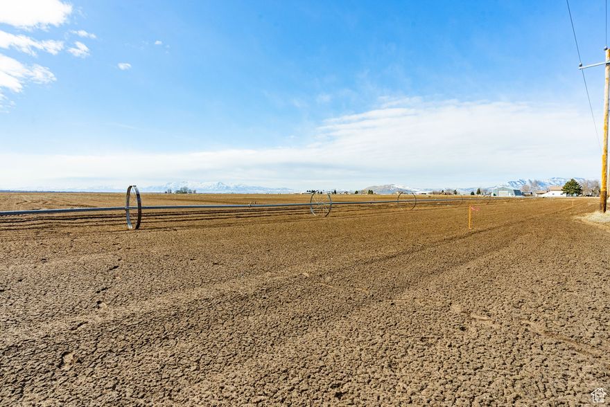 Looking to build your dream home, start a homestead, or invest in land with stunning views? This expansive rural property offers the perfect blend of peace, privacy, and possibility.  Wake up to panoramic vistas and sunsets.  Ideal for building and farming.  Buyer will need to install septic.  Utilities are close by. EAST LOT - Approximately 435 E 1600 S.