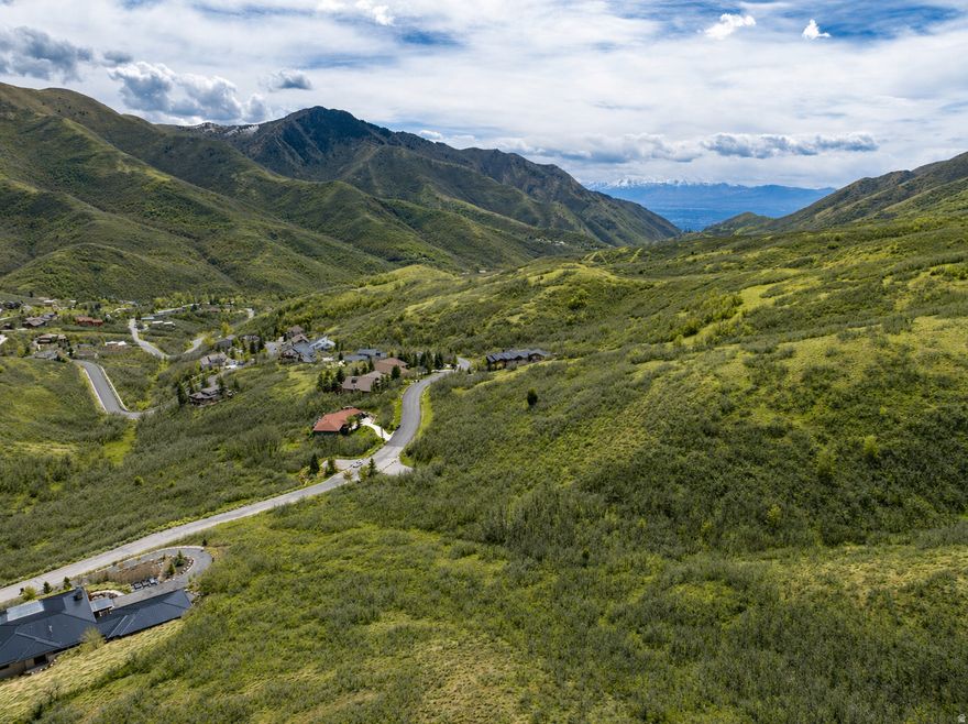 Perched in the quiet solitude of Emigration Canyon, this STUNNING 9.92-ACRE LUXURY HOMESITE is a canvas for the private estate you have always envisioned, with the planning already well underway. Natural gas, electricity, and irrigation water are all stubbed to the lot, culinary water is stubbed to the road via the Emigration Canyon Improvement District, and a perc test was completed in 2021. Existing plans include a recent TOPOGRAPHY ASSESSMENT, SEPTIC DESIGN, AND COMPREHENSIVE BUILDING PLANS featuring two distinct home designs, including multiple variations of a 4,000 sq. ft. residence, each with an accessory dwelling unit connected by a breezeway, with select plans including an outdoor swimming pool. A conservation easement on a portion of the property ensures lasting privacy and preserves the natural landscape for generations to come. The surrounding area is equally as impressive: the University of Utah, Red Butte Gardens, Bonneville Golf Course, Wasatch Hills Tennis Center, Emigration Market, and beloved local dining at Hash Kitchen and the iconic Ruth's Diner are all just minutes away, alongside world-class skiing, hiking, and outdoor recreation throughout the Wasatch Mountains and Park City. Your canyon retreat awaits. Buyer to verify all information to their own satisfaction.
