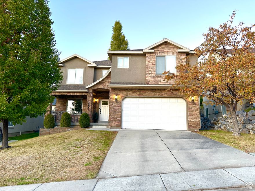 Welcome to this stunning home in the heart of Cedar Hills, nestled in a highly desirable neighborhood. The open floor plan features an updated, bright kitchen with quartz countertops that flows into a spacious living room, perfect for relaxing or entertaining. Flooring on the main floor is gorgeous and new this year! Enjoy a large primary suite upstairs with barn doors leading to the ensuite bathroom, and a spacious walk-in closet. The fully finished basement offers an additional family room and plenty of storage. Outside, you'll find a cozy yard with mature trees, automatic sprinklers, a shaded pergola, and a two-car garage. Take in sweeping mountain and valley views while being minutes from American Fork Canyon, Silicon Slopes, parks, golf, and endless outdoor recreation. Don't miss this beautiful Cedar Hills gem!