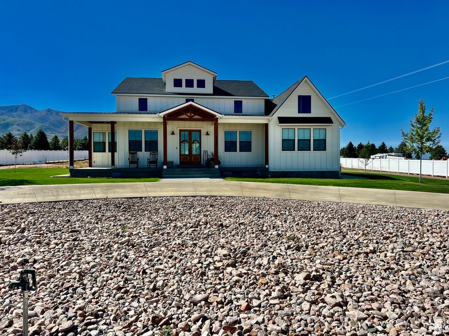 Modern Farmhouse on 1.16 Acres in Fillmore, Utah  This custom-built modern farmhouse, completed in 2021, offers quality craftsmanship, open living spaces, and incredible mountain views-all on a spacious 1.16-acre lot. The home features 3 bedrooms, 2.5 bathrooms, and a bright, open floor plan designed for both comfort and function. High ceilings, large windows, and custom finishes throughout give the home a fresh, timeless feel. Need more space? A full unfinished basement and an unfinished bonus room on the second level offer plenty of potential for future living areas, bedrooms, or a home office. Outside, you'll enjoy a large yard, a quiet neighborhood, and a covered front and back porch perfect for taking in the views. If you're looking for a newer home with room to grow in a peaceful setting, this one is worth a look.
