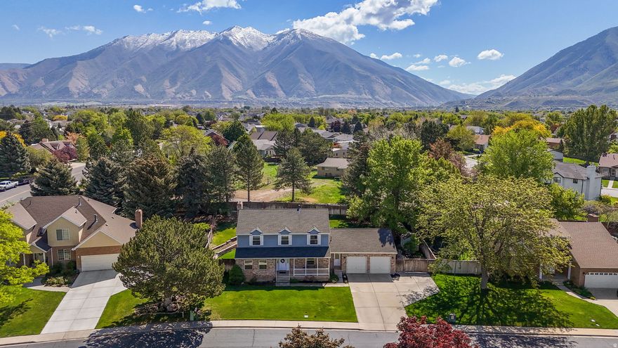 Fantastic Spanish Fork Location! Great quiet neighborhood/street.  West Facing home gives you afternoon/evening shade in the summer and great snow melt in the winter!  Large 2 Car Garage w/RV Pad & fully fenced yard lend to great family fun in the yard & on the patio.  Inside the home is spacious with lots of rooms for the family with Bedrooms, great Bath configurations, and main floor living w/a Den Office and a great Kitchen that opens up to the family room!  Great Family Home that offers so much lifestyle. New Windows last year, Roof 6 yrs Old ... Ready to go!
