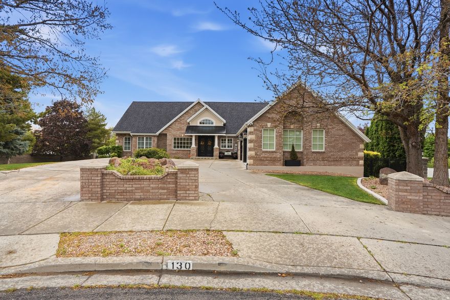 Completely remodeled in 2022, this exceptional Alpine estate sits on a quiet cul-de-sac and blends luxury with thoughtful design throughout. Highlights include beautiful new wood gridded and non-gridded Pella windows, European white oak floors, iron doors, and a Gourmet Chef's Kitchen with a 12x5 walnut island, quartzite surfaces, 48-inch 6-burner Thermador range with griddle stove, 36-inch SubZero fridge, 36-inch SubZero freezer, 2 Bosch dishwashers, 2 warming drawers, and 2 butler's pantries. The lower level features a mother-in-law apartment with private entrance, full kitchen, laundry, bath, and 2 bedrooms. Resort-style backyard offers 2 fiberglass saltwater pools, the second pool  seats 20+, heats above 100 degrees for a hot tub, or chills to approximately 42 degrees for cold plunges. Plus a regulation-size pickleball court/basketball court and mature landscaping. New roof in 2020. Minutes from American Fork Canyon, Alpine Country Club, Cedar Hills Golf Club, multiple parks, and Thanksgiving Point for shopping, dining, and entertainment.