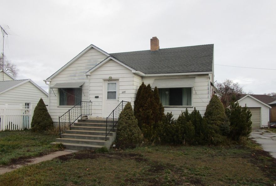 This cute bungalow boasts 3 Bedrooms and 1 3/4 bath with a large living room and downstairs family room!  It has a private covered back porch with a smaller fenced backyard for your dog.  Don't miss out on this one!!