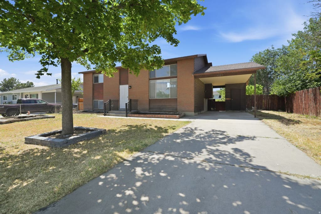 Photo of 6166 S CUMULUS CIR W, Kearns, UT 84118 (MLS # 2164858)