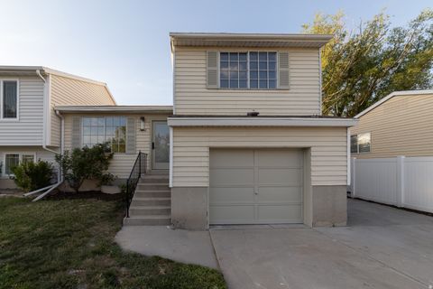 Photo of 1394 W TWIN OAKS DR, West Jordan, UT 84088 (MLS # 2158189)