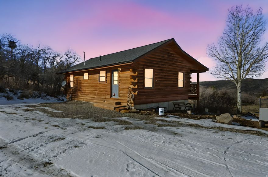 his cozy, well-cared-for log cabin offers timeless rustic charm in a desirable mid-mountain location within the beautiful gated community of Timber Lakes. Warm wood accents, vaulted tongue-and-groove ceilings, gorgeous natural light and inviting living spaces create a true mountain retreat. Perfect for unwinding, recharging, and reconnecting with nature. The functional floor plan features full bathrooms on each level and comfortably sleeps up to 12 in beds, making it ideal for hosting family and friends. Enjoy soft new carpet, a new roof (2023), and a new furnace for peace of mind. Furnishings are negotiable, allowing for an easy, turnkey transition. A flat gravel driveway provides plenty of parking and easy year-round access. Step outside to savor crisp mountain air, morning coffee on the covered back deck, breathtaking sunsets, and star-filled nights surrounded by nature's quiet beauty. Whether you're seeking a weekend escape, a year-round retreat, or a place to create lasting memories, this cabin delivers comfort, character, and the tranquility of true mountain living. Enjoy endless outdoor activities and all the wonderful amenities of Park City, Heber, and Midway right at your fingertips!