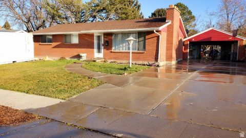 Photo of 3587 S BLACKHAWK DR W, West Valley City, UT 84120 (MLS # 2125458)