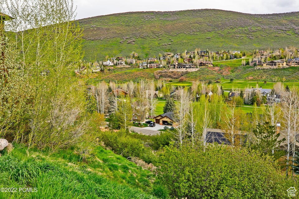 Conveniently located on Homestead Road, this lot offers a gradual uphill slope across from the golf course. Design your custom home in the desirable Jeremy Ranch neighborhood with easy commute to SLC or downtown Park City, walking distance to Jeremy Ranch Elementary and adjacent to elaborate trail system.