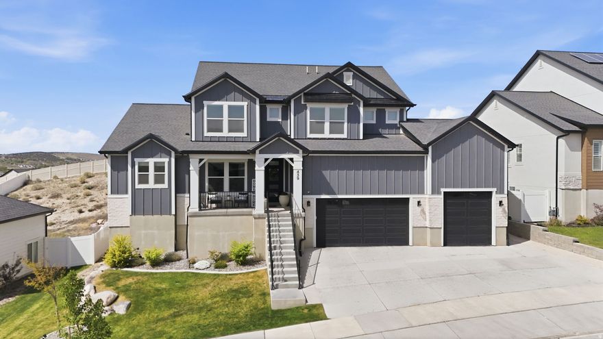 Welcome to this beautifully upgraded home located at 439 N Highland Rd, offering a perfect blend of comfort, functionality, and outdoor living. This property has been thoughtfully improved throughout, featuring a new HVAC system installed in 2024 for enhanced efficiency and year-round comfort.  The home also includes a radon mitigation system for added peace of mind, and all front-facing windows have been replaced to improve insulation and reduce outside noise.  Inside, you'll appreciate the functional layout with walk-in closets in every bedroom, providing ample storage throughout. The spacious primary suite stands out with its own private washer and dryer, adding an extra level of convenience and separation.  The fully finished garage showcases a clean epoxy floor and includes a built-in Tesla charger, making it ideal for electric vehicle owners. The basement has already been framed with electrical work completed, providing a head start for additional living space or customization to fit your needs. A water softener system is also included for added convenience.  Step outside and experience one of the home's standout features, over $100,000 invested into the backyard, creating an incredible space to relax and entertain. Enjoy stunning, unobstructed views with no rear neighbors, offering added privacy. The massive 25 x 50 concrete pad is perfect for sports, gatherings, or future additions. Permanent exterior lighting has been installed, adding both curb appeal and functionality.  This home offers a rare combination of upgrades, privacy, usable space, and outdoor enjoyment, truly a must-see.