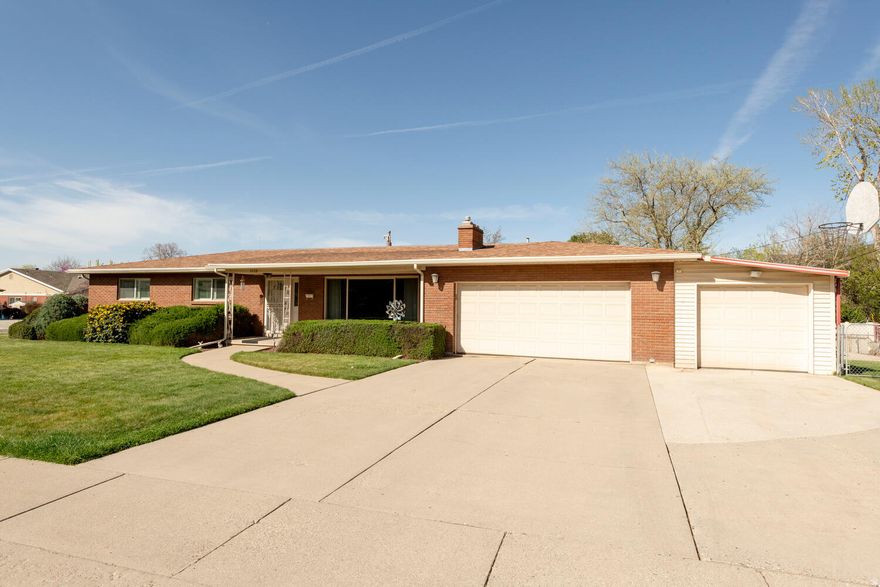 OPEN SATURDAY MARCH 28TH 12:00P TO 2:00PM! IMPECCABLE ORIGINAL OWNER RANCH STYLE HOME FEATURING 4 CAR GARAGES! 3 ATTACHED, ONE DETACHED! Very large .30/ac lot*This home has been so well cared for and preserved/loved...inside and out since 1960*New carpet thruout w/ hardwood flooring*Updated oak kitchen*Updated furnace, vinyl windows & roof*Hot tub or main floor family room*Charming original tile in baths*Primary bedroom bath*3 beds on main*Gas fireplace*Heat + A/C in garage w/work benches*Tons of storage down*Easily converted to 3/4 bath downstairs*Separate basement entry*Nicely maintained yard for many years includes full top of line auto sprinklers! Always a high demand area with walking distance to all schools, shopping and restaurants*MUST SEE TO APPRECIATE...