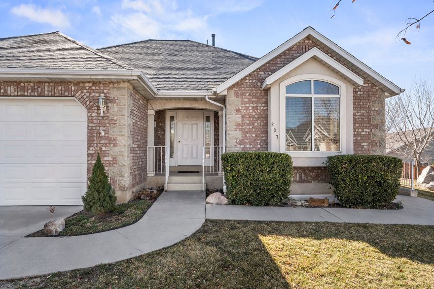 OPEN HOUSE & ESTATE SALE - SATURDAY, MARCH 14th 8:00 AM - NOON.   An attached ADU this close to UVU and I-15 makes this hidden gem perfect for first time home-buyers, looking for a house-hacking opportunity to pay part of your mortgage.  Or be the grandparents with the coolest hideaway hangout for all your student grandkids.  Welcome business or personal guests into your formal living room or office space behind French doors directly Inside the front door.  The unexpected, yet convenient hallway to the primary bedroom is perfect for early morning office tasks in your PJ's.  Enjoy a juicy peach plucked from your mature fruit tree while you watch the sunset from your private retreat under your covered patio. Breathe in the quiet evenings and summer gatherings outdoors, nestled in the deepest pocket of this secluded close-knit neighborhood. Or cozy up to your gas fireplace in the spacious open-concept family room.   You would never know you are just off the Center Street exit in Orem with the peaceful privacy afforded in this little piece of heaven. End-unit provides large windows throughout the home.   Side access to the basement apartment with 2 bedrooms, 1 bath, huge kitchen/family room combo and large pantry with floor to ceiling storage shelves. Don't forget the built-in painted cabinets with doors in the garage, to hide away your hobby hodgepodge.  Rest assured that all appliances have been replaced in the past year and are included. Roof replaced within the last 5 years, new water heater, HVAC installed in 2019.