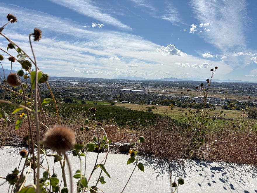 Set high on the Pleasant View Bench, these impressive nearly one-acre lots combine expansive space with spectacular mountain, valley and sunset views. Each lot offers the perfect canvas for a custom home designed to take full advantage of the natural beauty and privacy this area provides. With generous lot sizes rarely found in such a premier location, you'll enjoy both open space and convenience-just minutes away from hiking trails, skiing, parks, schools and local amenities. These exceptional view lots present a rare opportunity to create your dream home in one of Pleasant View's most desirable neighborhoods.