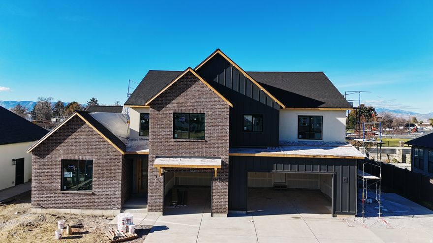 The Madison, one of our most sought-after floor plans, now available in the beautiful Autumn Crest neighborhood in American Fork, UT. Designed with space and comfort in mind, this home offers a bright, open feel perfect for modern living. The main level features a luxurious primary suite with a spa-like en-suite bath and a private office, ideal for work or relaxation. The open floor plan, high ceilings, custom finishes, and fireplace along with many built ins and arches make this feel like HOME. This is our Final phase. The Basement set up for a future ADU with Basement entrance. Upstairs, you'll find four spacious bedrooms and two full bathrooms, providing room for everyone. Scheduled for completion end of the  year. Ask about our 4.99% fixed rate for qualified buyers closed before end of the year.