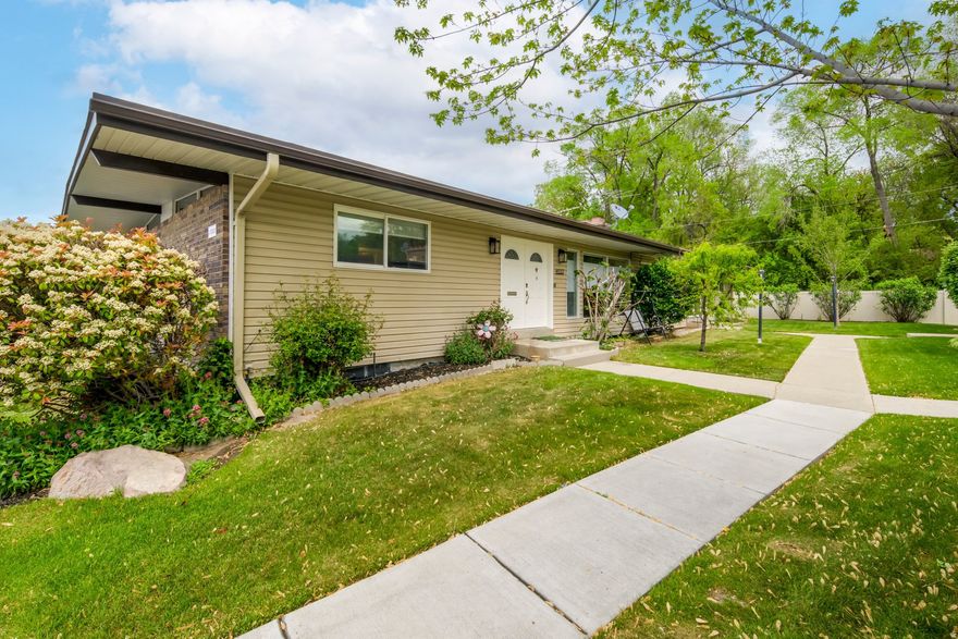 Tucked into a quiet, rarely available community in desirable Holladay, this rambler-style condominium offers easy, single-level living with the added flexibility of a fully finished basement. The main floor features two bedrooms and two bathrooms, including a primary suite with a private three-quarter en-suite bathroom. Hardwood flooring runs throughout both levels, creating a clean, cohesive feel. Downstairs, you'll find two additional bedrooms, a full bathroom, and plenty of space for guests, a home office, or hobbies. Enjoy outdoor living on the covered patio perfect for relaxing or entertaining. The attached two car carport offers convenience today with the potential to be enclosed and converted into a garage. A rare opportunity in a sought after location with low turnover, don't miss it. Reverse osmosis system has been added.  Square footage figures are provided as a courtesy estimate only and were obtained from county records. Buyer is advised to obtain an independent measurement. Buyer/Buyer's Agent to verify all info.