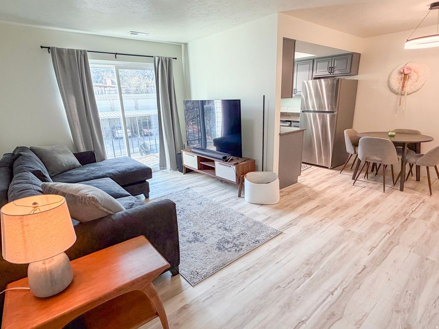 This beautifully updated Millcreek condo is move-in ready and waiting for you. Recent renovations include new flooring, freshly painted kitchen cabinets, a new kitchen sink and hardware, a brand-new bathtub with full surround, updated bathroom cabinets, mirrors, and lighting in both bathrooms. Plus a smart thermostat. Located at the back of the community, the condo offers added privacy and sweeping views of the Wasatch Mountains. It comes furnished, with the option to include the brand-new washer and dryer. Don't miss out on this charming, turnkey gem!