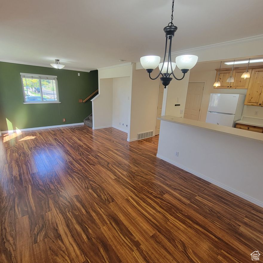 End unit 3 bedroom, 2.5 bath townhouse located in a convenient Ogden location. Features a 504 square foot attached 2 car garage. Master bedroom has a full bath, walk in closet, and patio with beautiful mountain views. Storage in garage and additional storge off half bath, under the stairs. HOA takes care of yard, snow removal of common areas, and outside of townhome making maintenance free yardwork. A great place to call home! Equal Housing Opportunity.