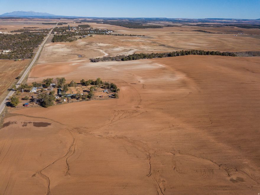 Discover 61 acres of beautiful, versatile land for sale in Eastland, Utah - the perfect blend of income potential, recreation, and rural living. This productive property offers crop-share opportunities with dry farmed organic wheat or safflower, giving you a chance to generate passive income while owning a piece of Utah's wide-open countryside. Located within the CWMU, it also provides access to excellent hunting and wildlife opportunities right on your land. The property has convenient road access, and power is nearby with connection fees applying. It's currently in greenbelt status, keeping property taxes low. It is zoned Community Commercial on a portion bordering Easland Road. Whether you're looking to invest, farm, hunt, or simply enjoy a peaceful retreat surrounded by nature, this land has endless potential. *The parcel has been divided recently and the treed section on the north (15 acres) is not included in the 61 acres. *Note on Location: Please note that the address of 356 S Eastland Rd is for mapping and syndication purposes only. This property has not yet been assigned an official address. This estimated location is provided solely to assist buyers in identifying the general area.