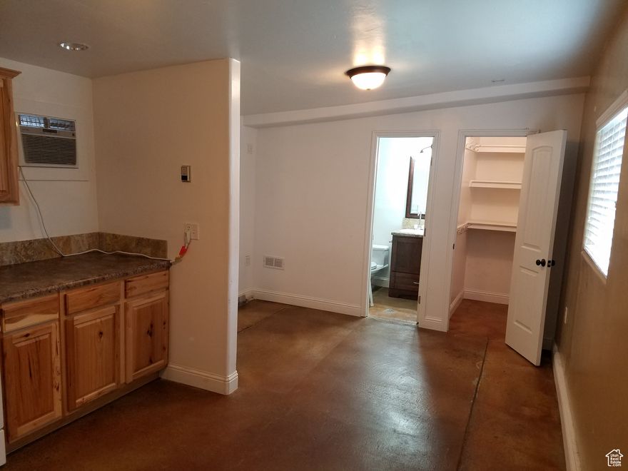Charming studio cottage for rent. Rent includes all utilities! Open floor plan with pantry and walk-in closet. Located on a quiet alley 1/2 block from Trax. Off street parking for one car. No smokers. No animals. Call to schedule a showing.