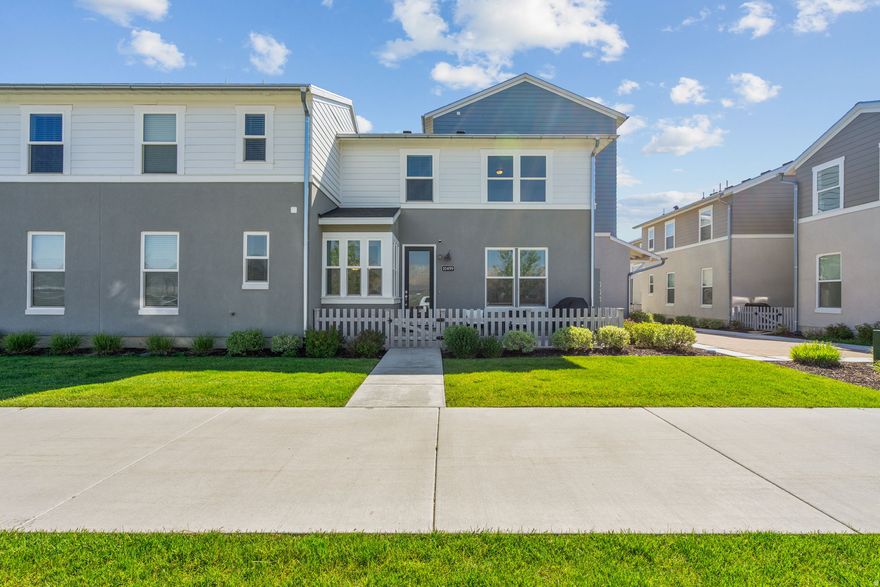 Welcome to this beautifully maintained 3-bedroom, 2.5-bath end-unit townhome in the heart of Daybreak! Offering extra natural light and added privacy, this home combines comfort, convenience, and community. Enjoy an open-concept layout perfect for entertaining, spacious bedrooms, and a functional floor plan designed for everyday living. Why wait for new construction when you can have a clean, well-kept home, complete with appliances included, saving you thousands in upfront costs? The seller is open to negotiating furniture, and the home is energy efficient. Located just minutes from TRAX and within walking distance to The Ballpark at America First Square, you'll love the accessibility and vibrant atmosphere. Plus, enjoy all that Daybreak has to offer-community pools, summer concerts, holiday events, trails, parks, and beautiful Oquirrh Lake just moments away. Low-maintenance living in one of the valley's most sought-after communities. Don't miss this opportunity!